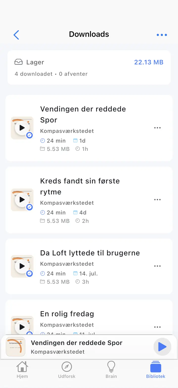 Skærmen for de downloadede episoder — The Podcast App, kører på dette sprog.